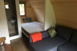 The deluxe en suite glamping pod with double bed, double sofa bed and en suite wet room