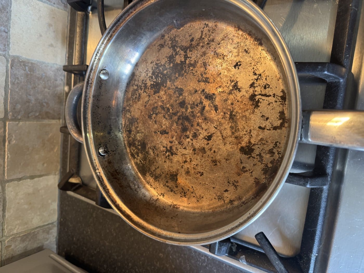 How to Clean a Campfire-Burnt Frying Pan (No Miracle Products Required)